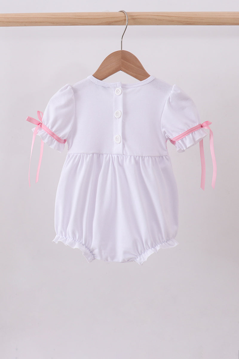 White cross smocked ruffle bubble