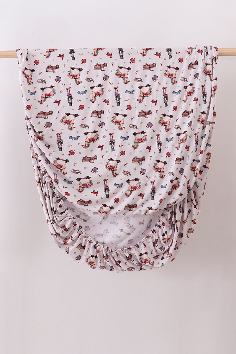 Brown nutcracker bamboo crib sheet