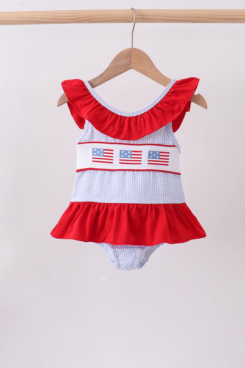 Blue seersucker flag smocked ruffle swimsuit