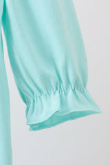 Blue gingerbread applique ruffle bubble