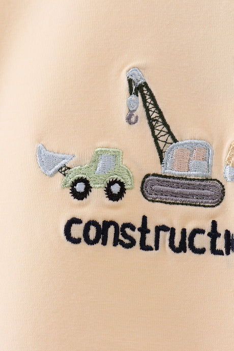 Beige construction embroidery top