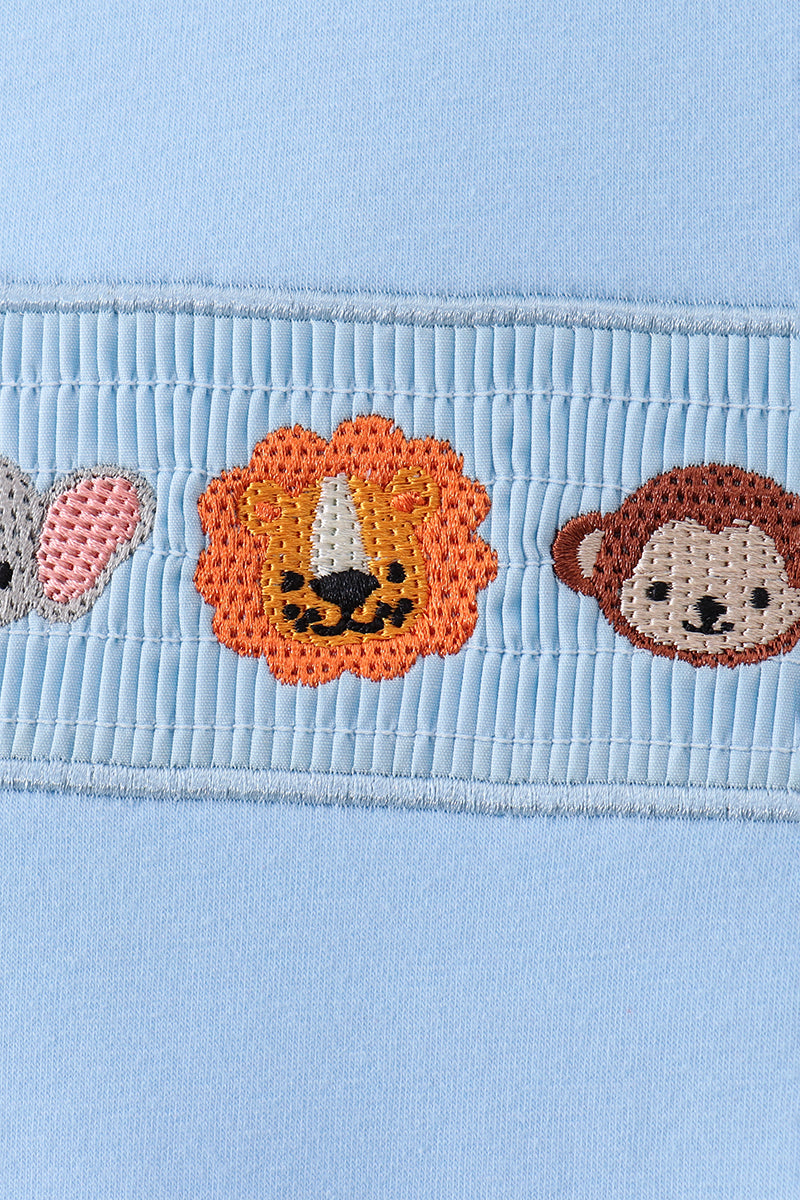 Blue animal smocked top