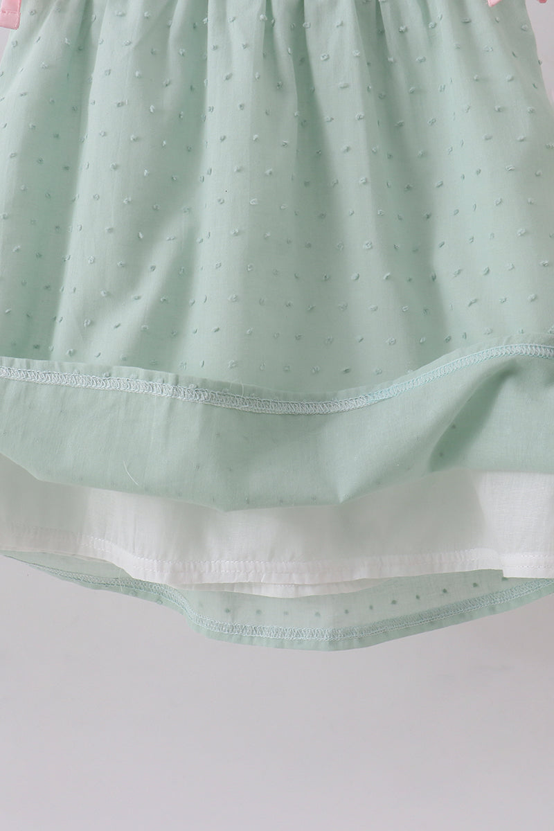 Green swiss dot cross sheep ruffle dress
