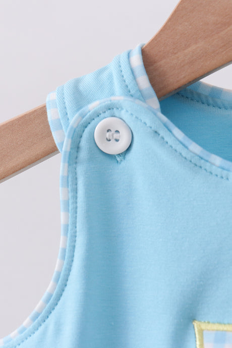 Blue cross applique top