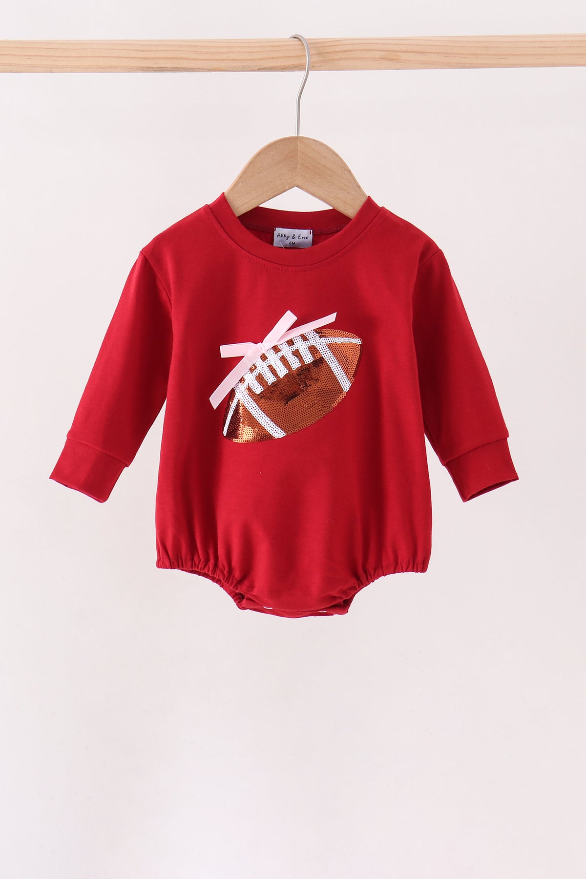 Maroon football bow sequin bubble