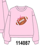Pink football sequin mom&me top
