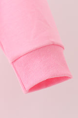 Pink football sequin mom&me top