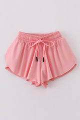 Light pink girl's flowy sports shorts