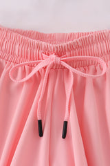 Light pink girl's flowy sports shorts