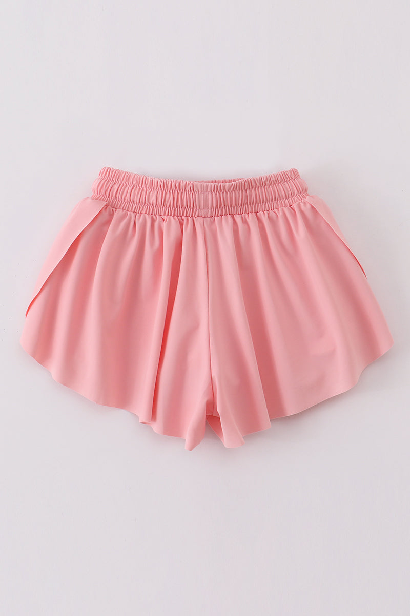 Light pink girl's flowy sports shorts