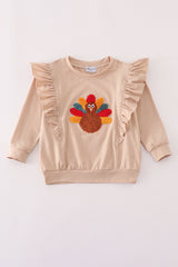 Beige turkey french knot ruffle top