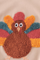 Beige turkey french knot ruffle top