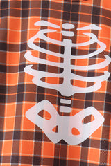 Orange skeleton plaid romper