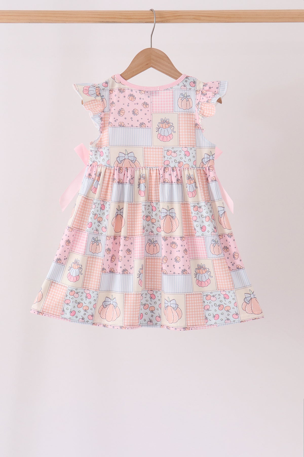 Pink pumpkin print ruffle dress