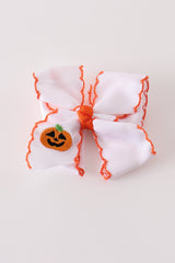 Orange Jack-O-Lantern embroidery crochet edge hair bow