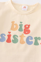 Cream big sister top