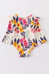 Floral ruffle baby onesie