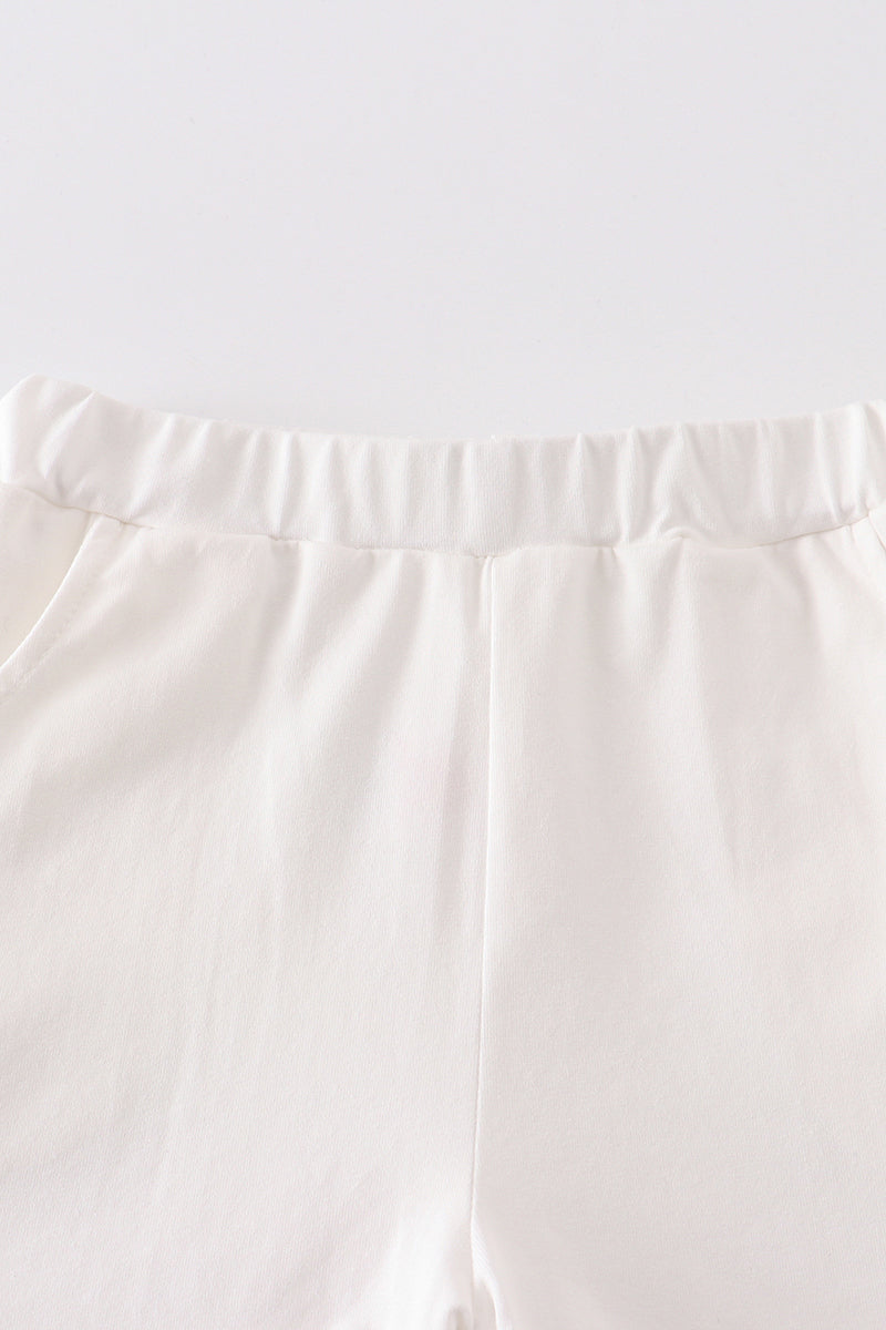 Cream basic ruffle shorts