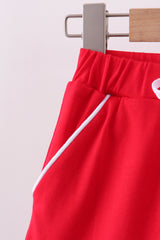 Red scallop hem bow skirt