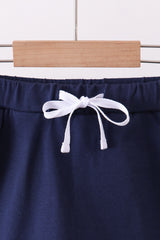 Navy scallop hem bow skirt