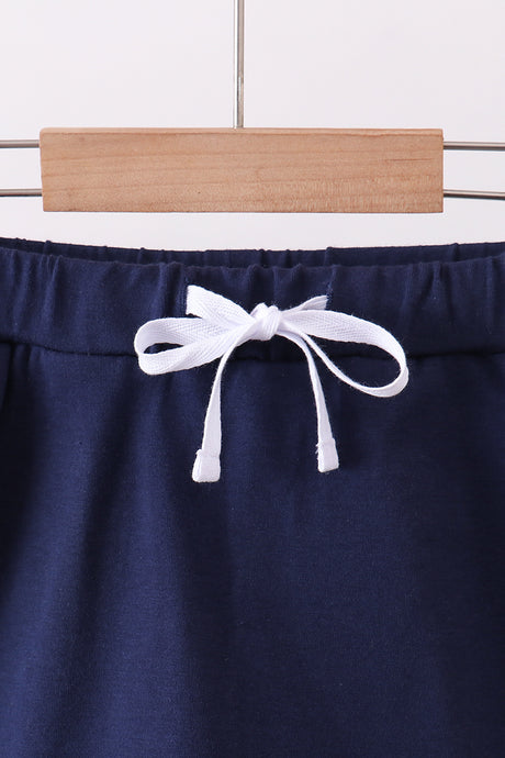 Navy scallop hem bow skirt