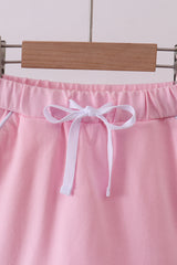 Pink scallop hem bow skirt