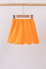 Orange scallop hem bow skort