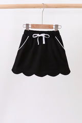 Black scallop hem bow skort