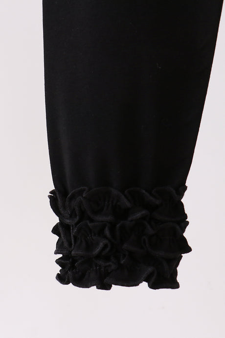 Black icing ruffle pants