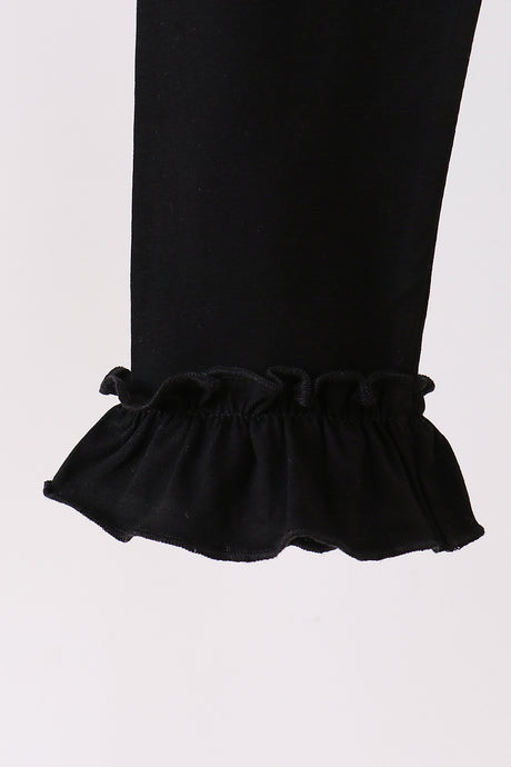 Black ruffle pants