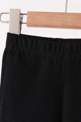Black scalloped bell pants