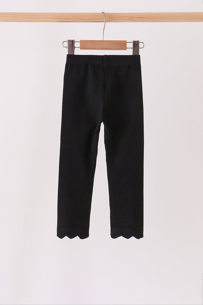 Black scalloped leggings