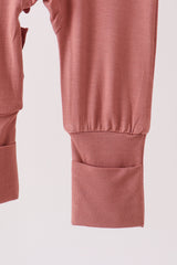 Dusty rose ruffle zipper bamboo romper
