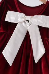 Maroon velvet bow dress