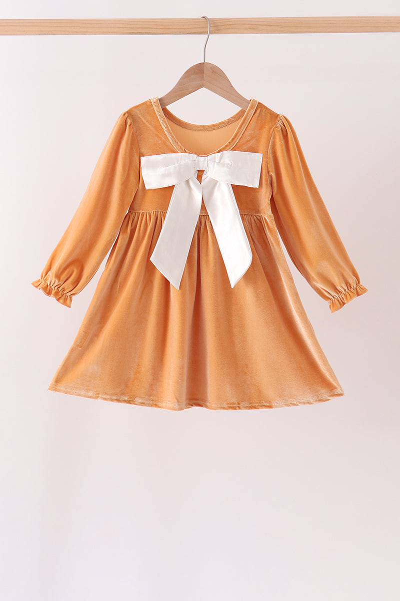 Gold velvet bow dress