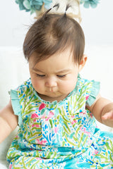 Green lily print ruffle girl baby gown