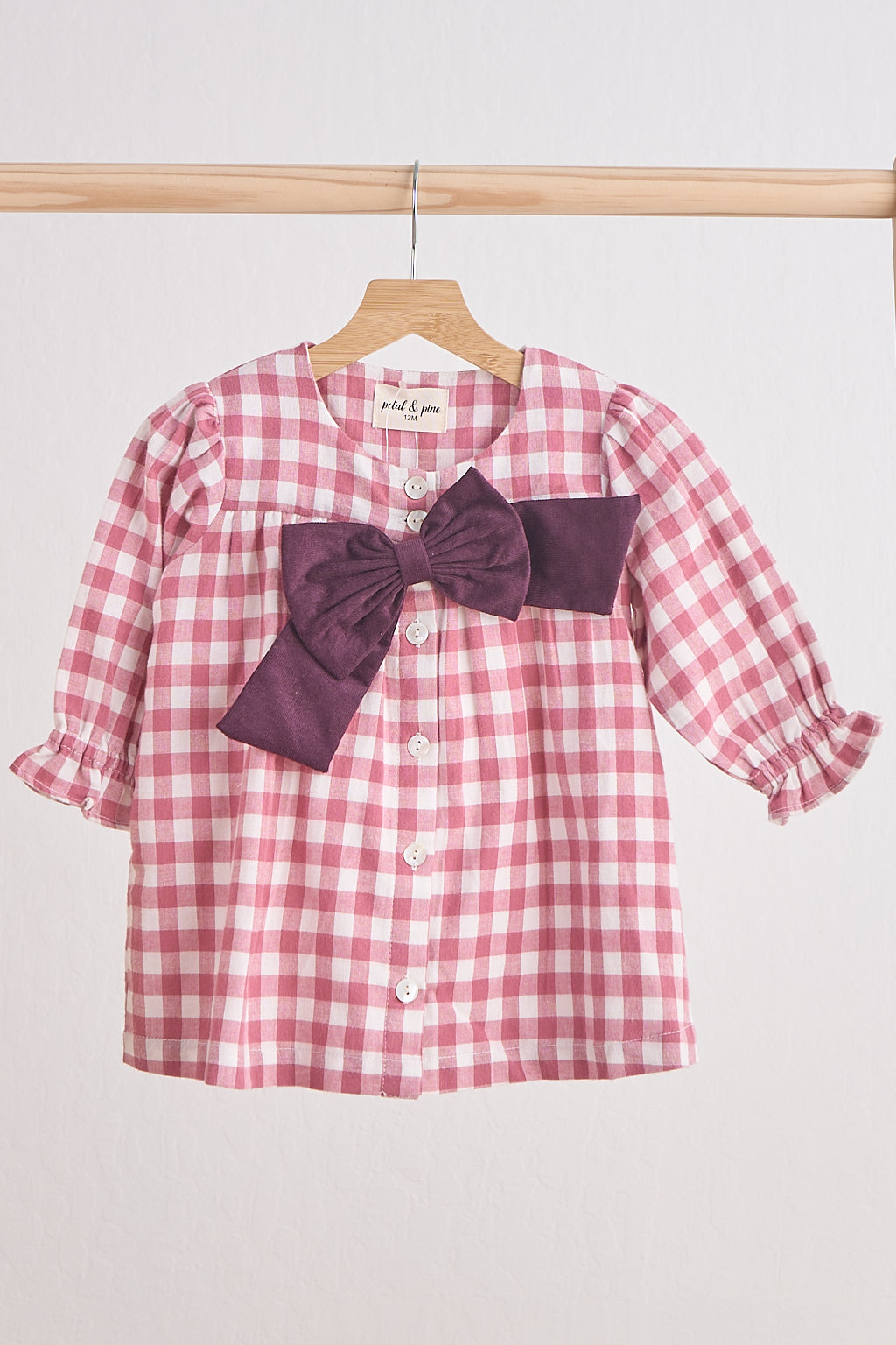 Pink gingham flannel bow dress