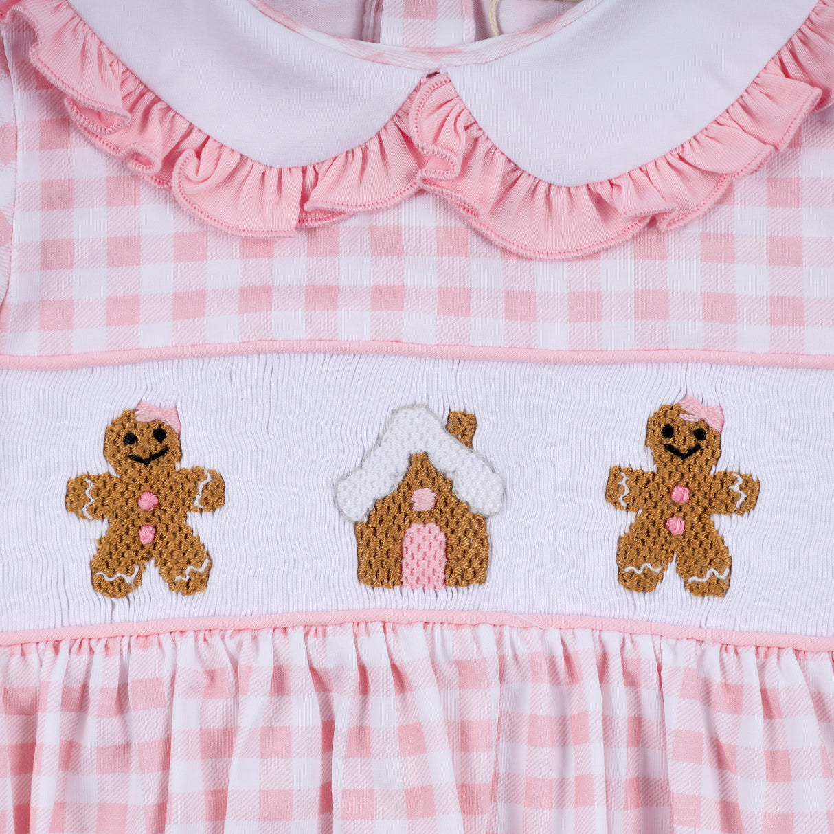 Pink gingerbread hand smocked gingham ruffle bubble
