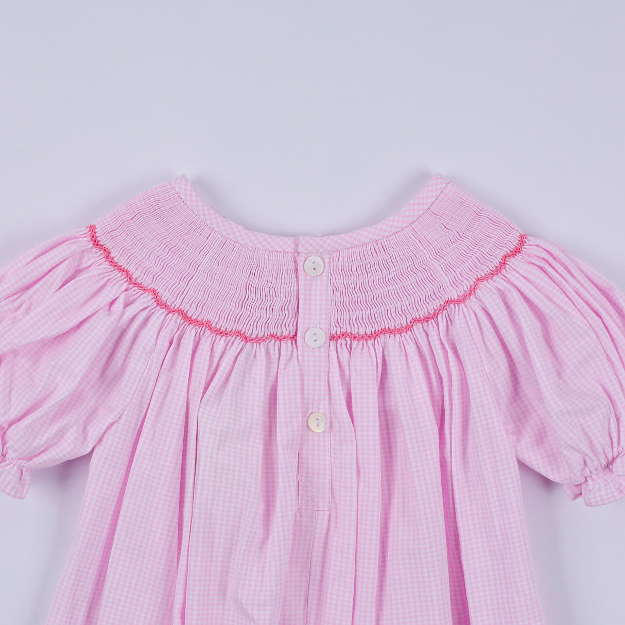 Pink christmas tree hand smocked ruffle romper