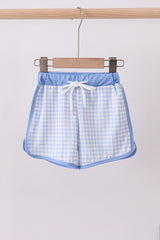 Blue gingham swim trunks