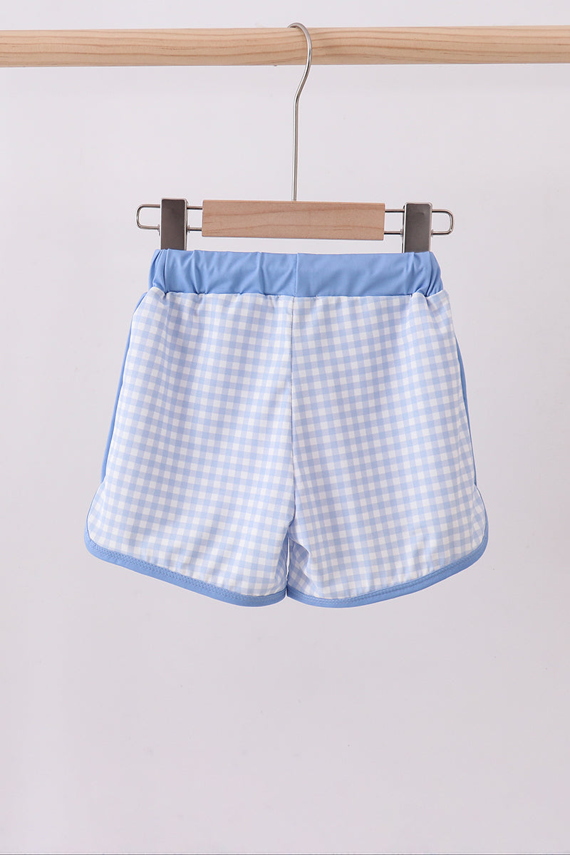 Blue gingham swim trunks