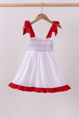 White smocked jacquard ruffle dress