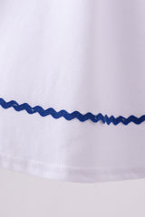 White flag smocked ruffle dress