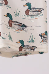 Sage duck print swim trunks
