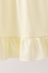 Cream smocked ruffle dress