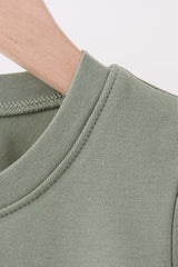 Green pumpkin french knot top