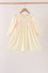 Cream smocked bow dress