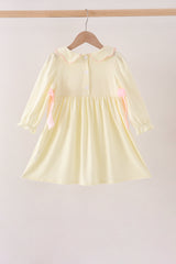 Cream smocked bow dress