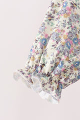 Blue floral smocked jumpsuit
