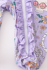 Purple skeleton floral ruffle baby romper